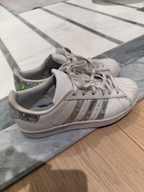 adidas White Kids Sneakers with Holographic Stripe Accents